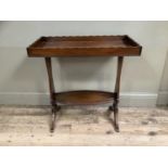 A mahogany tray top occasional table on twin supports, 73cm wide