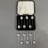 A boxed set of six George V silver coffee spoons with bean ends, Birmingham 1925 for Marson & Jones,