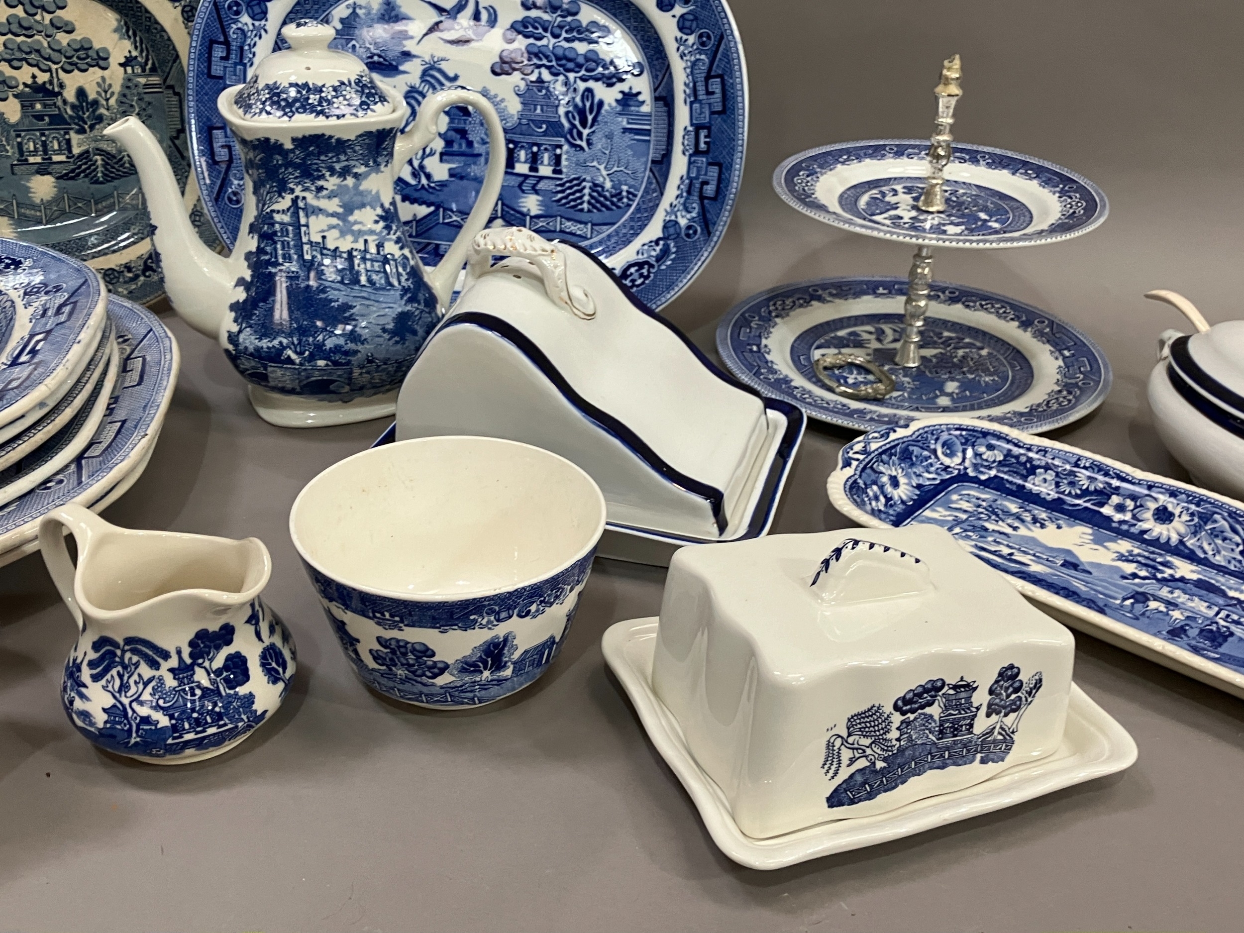 A collection of blue and white ware comprising several willow pattern meat plates, willow pattern - Image 3 of 4