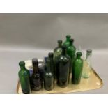A collection of Harrogate bottles including three in green glass marked with Harrogate and a crown