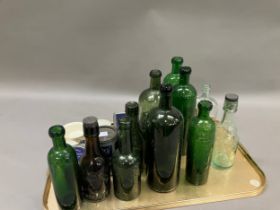 A collection of Harrogate bottles including three in green glass marked with Harrogate and a crown