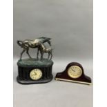 A mantel clock with moulded horse and foal figure group together with another quartz mantel clock