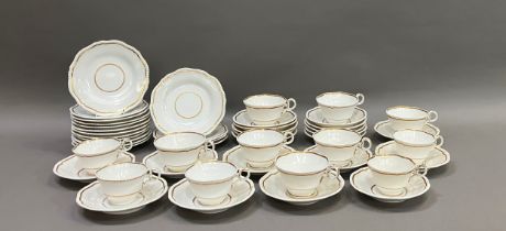 A 19th century Spode part breakfast service with gadrooned rims highlighted in gilt comprising seven