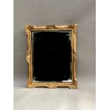 A gilt framed wall mirror, 54cm x 77cm