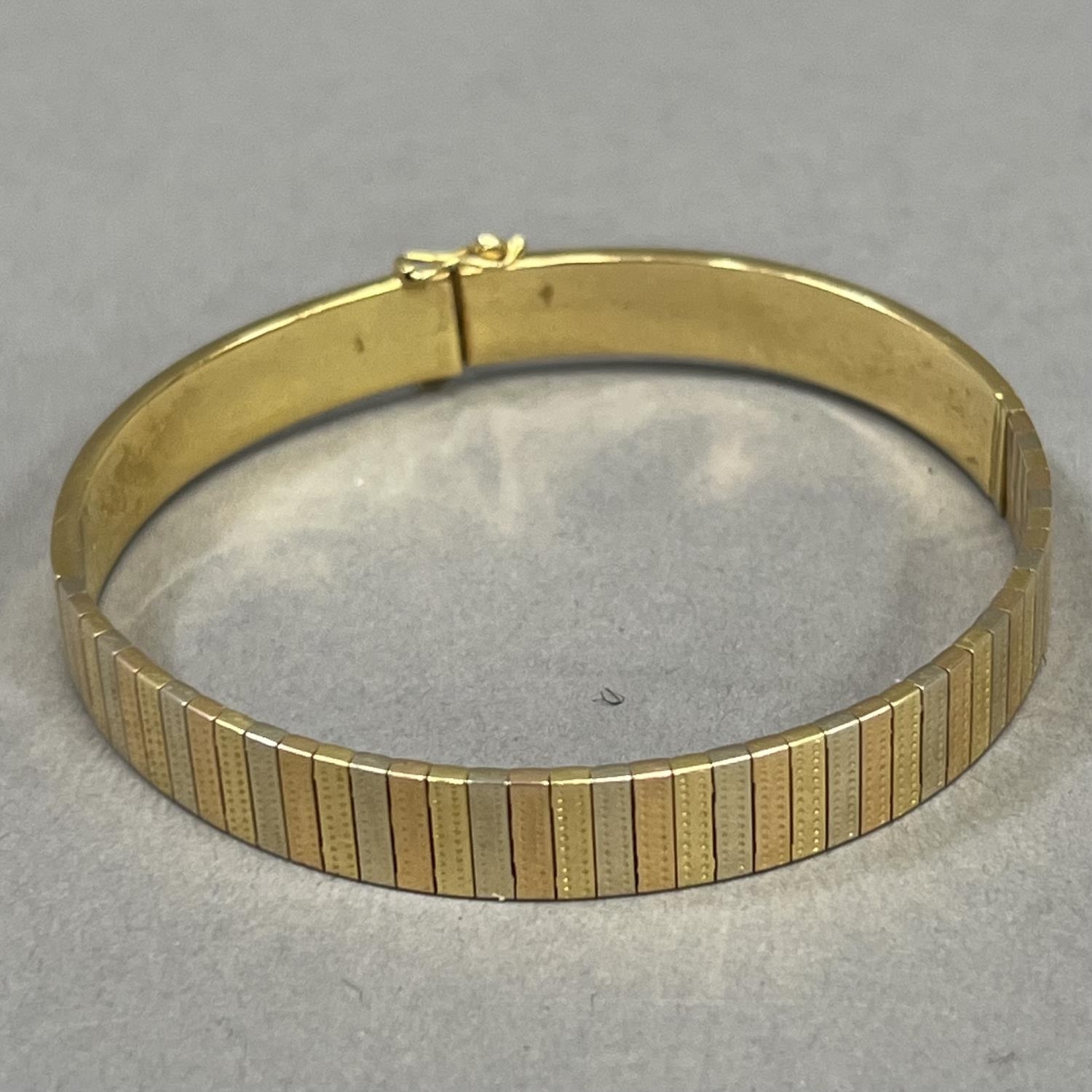 A bracelet of flexible brick type links, A/F, in white, yellow and rose metal (test as 18ct gold), - Image 2 of 3