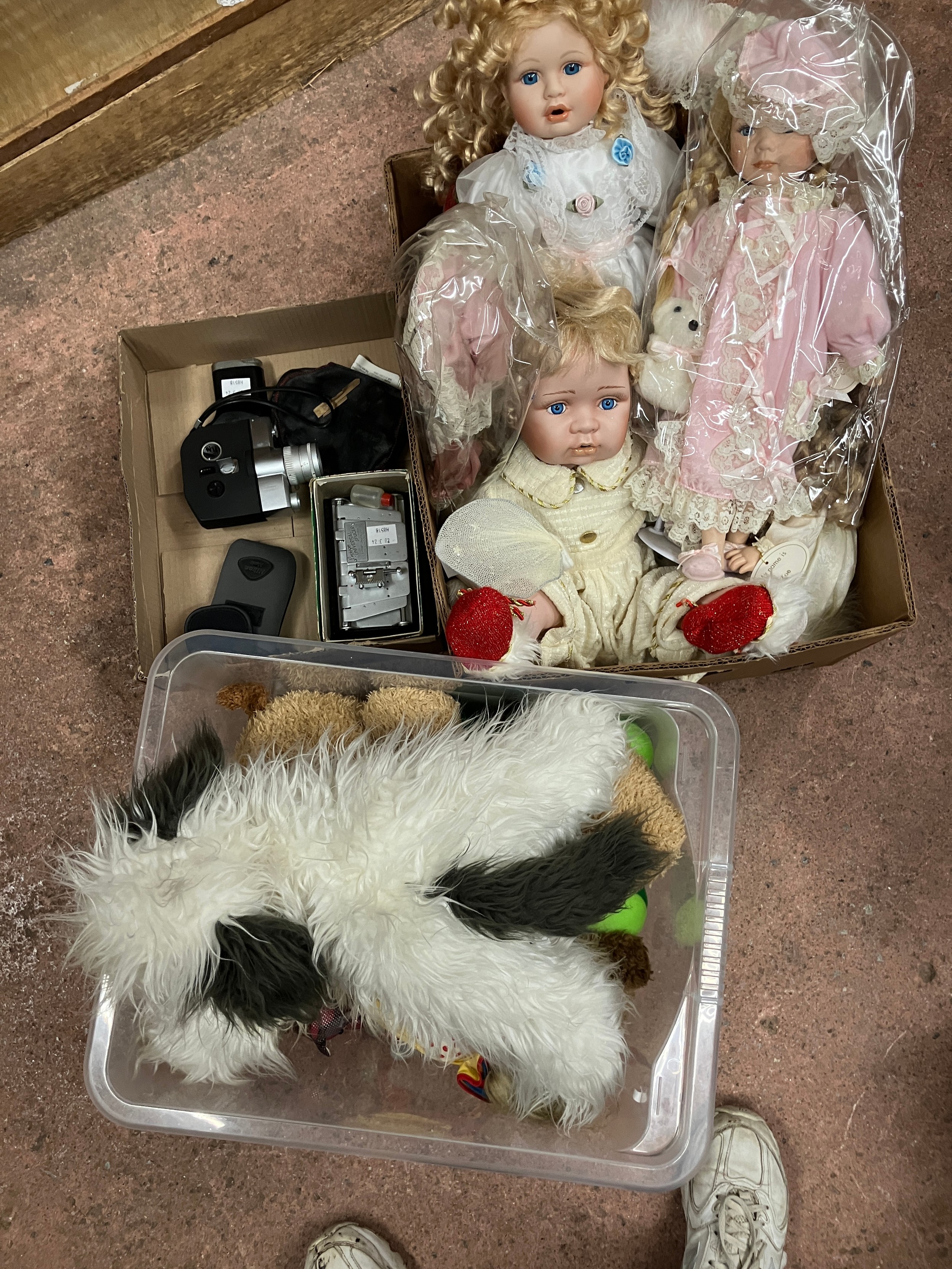 A collection of soft toys together with Fujica camera etc