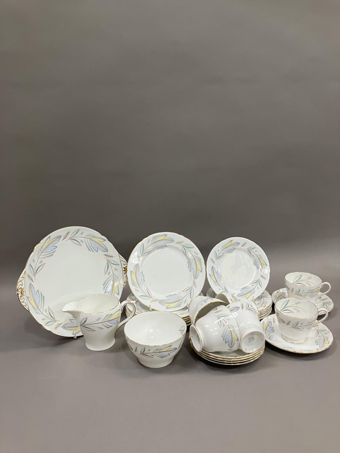 A Shelley Caprice pattern tea service for six comprising cups, saucers, cake plates, tea plates,