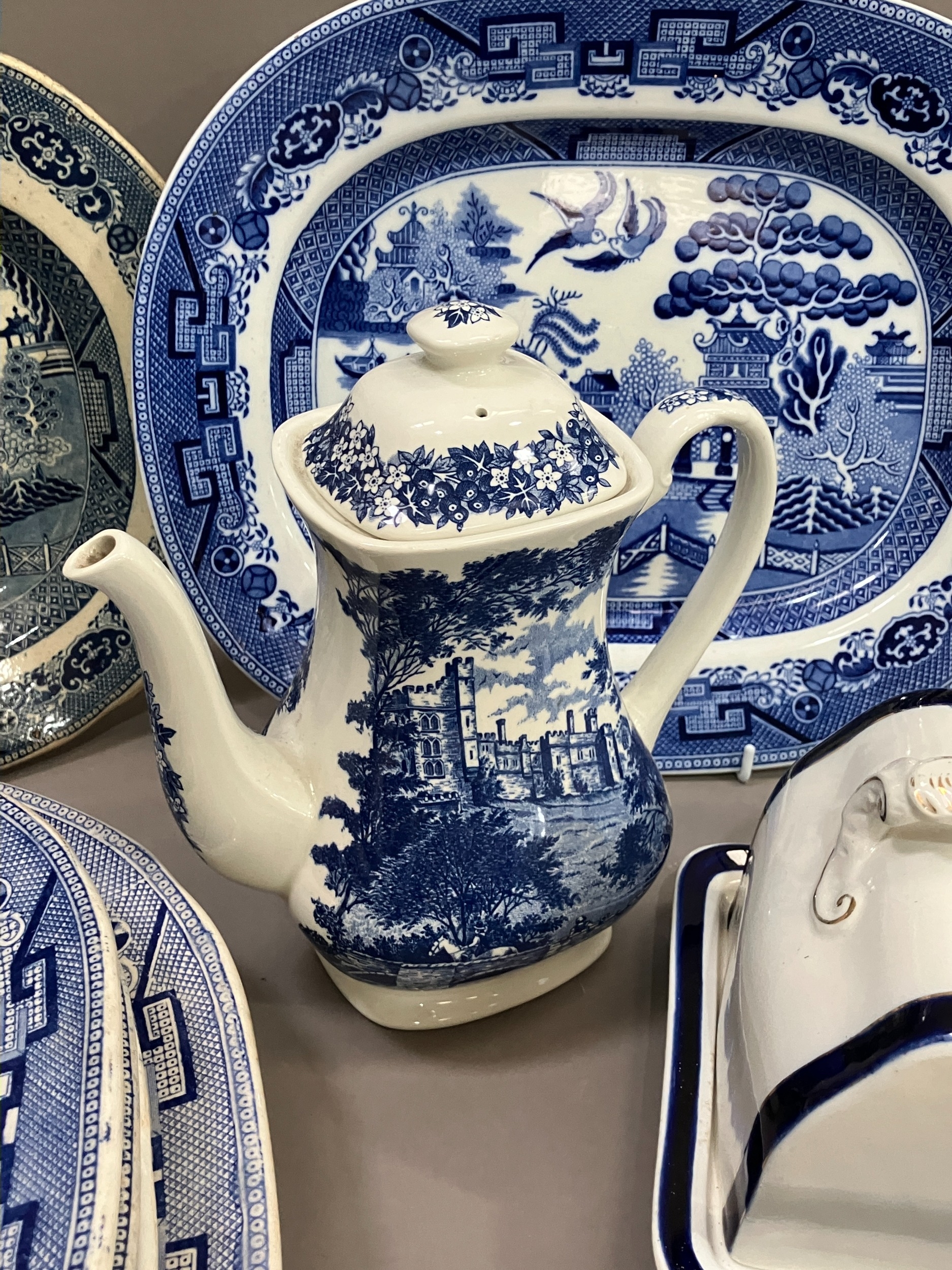 A collection of blue and white ware comprising several willow pattern meat plates, willow pattern - Image 4 of 4