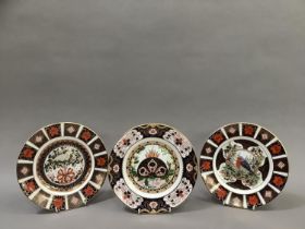 Three Royal Crown Derby Christmas plates, 1992 No: 213/ 2000, decorated with a partridge in a pear