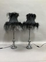 A pair of chrome effect table lamps, the supports moulded as pineapples, on paw feet and having