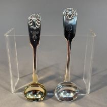 Two Victorian silver fiddle and shell pattern mustard spoons, one engraved with crest 'Nobilis Ira',