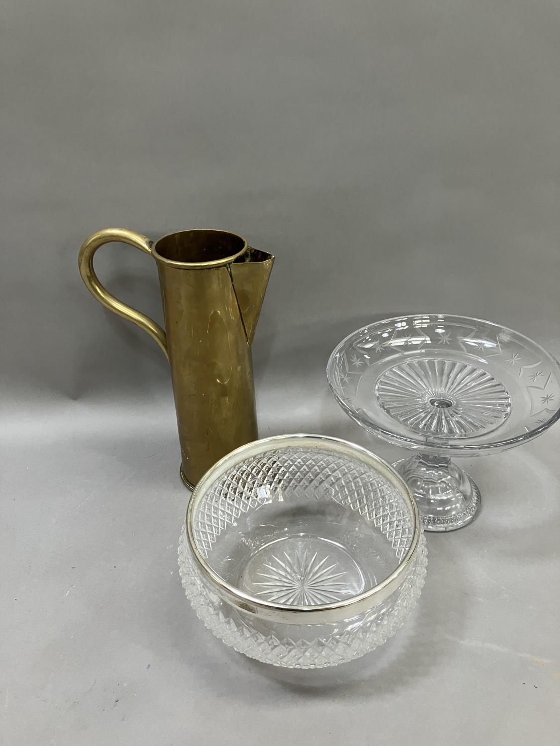 A Mappin and Webb cut glass dessert bowl, an etched and moulded brass tazza and a brass jug formed - Image 2 of 4