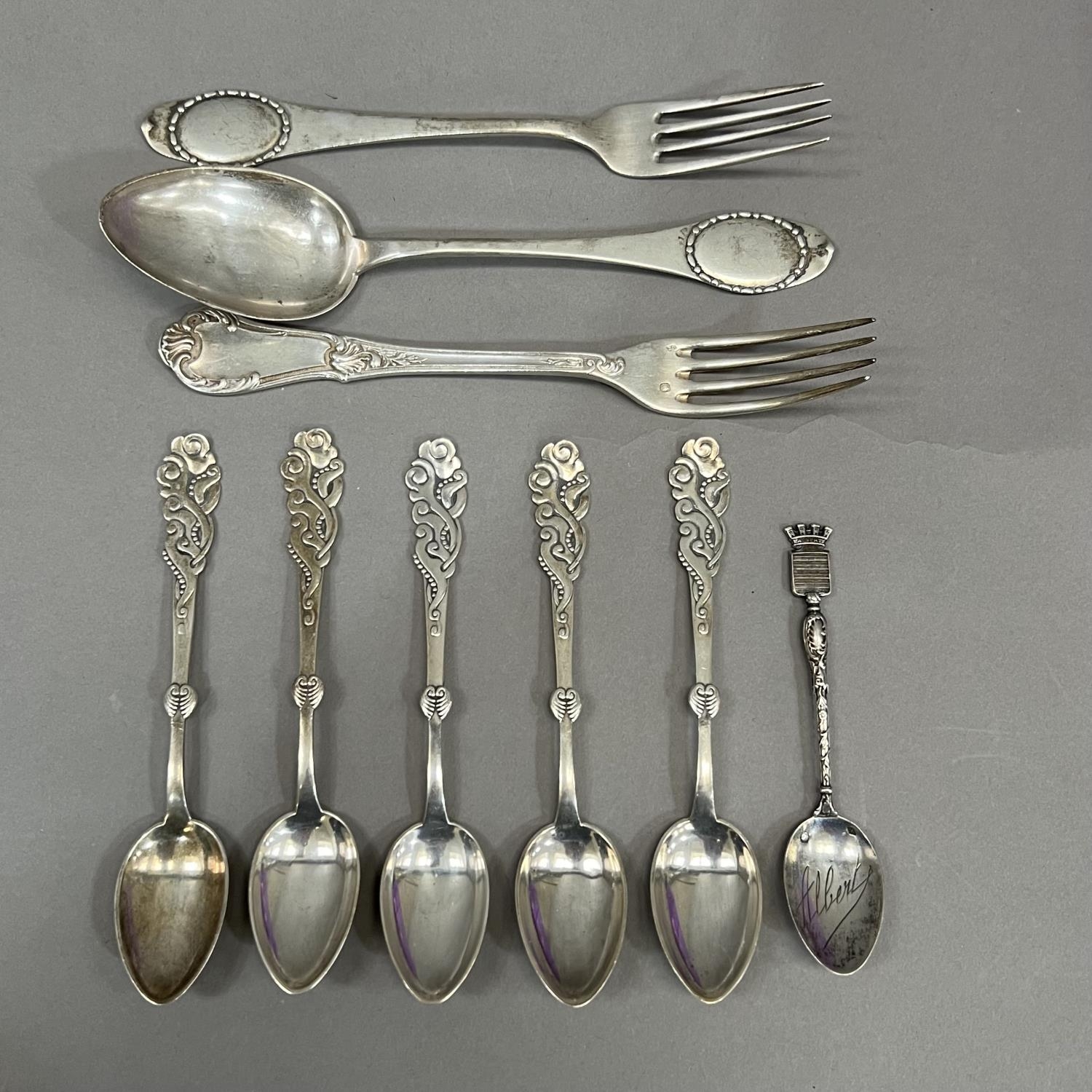 A small collection of late 19th and early 20th century continental silver cutlery including five art