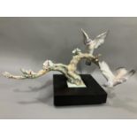 A Lladro figure group, Forest Song, Utopia series depicting birds on a two limbed branch with