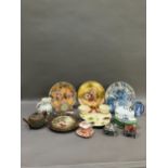 A collection of ceramics comprising a moulded hors d'oeuvres tray formed as a basket with lilies,