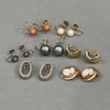 Seven pairs of earrings all with clip or screw fittings and all in yellow or white metal (tests as