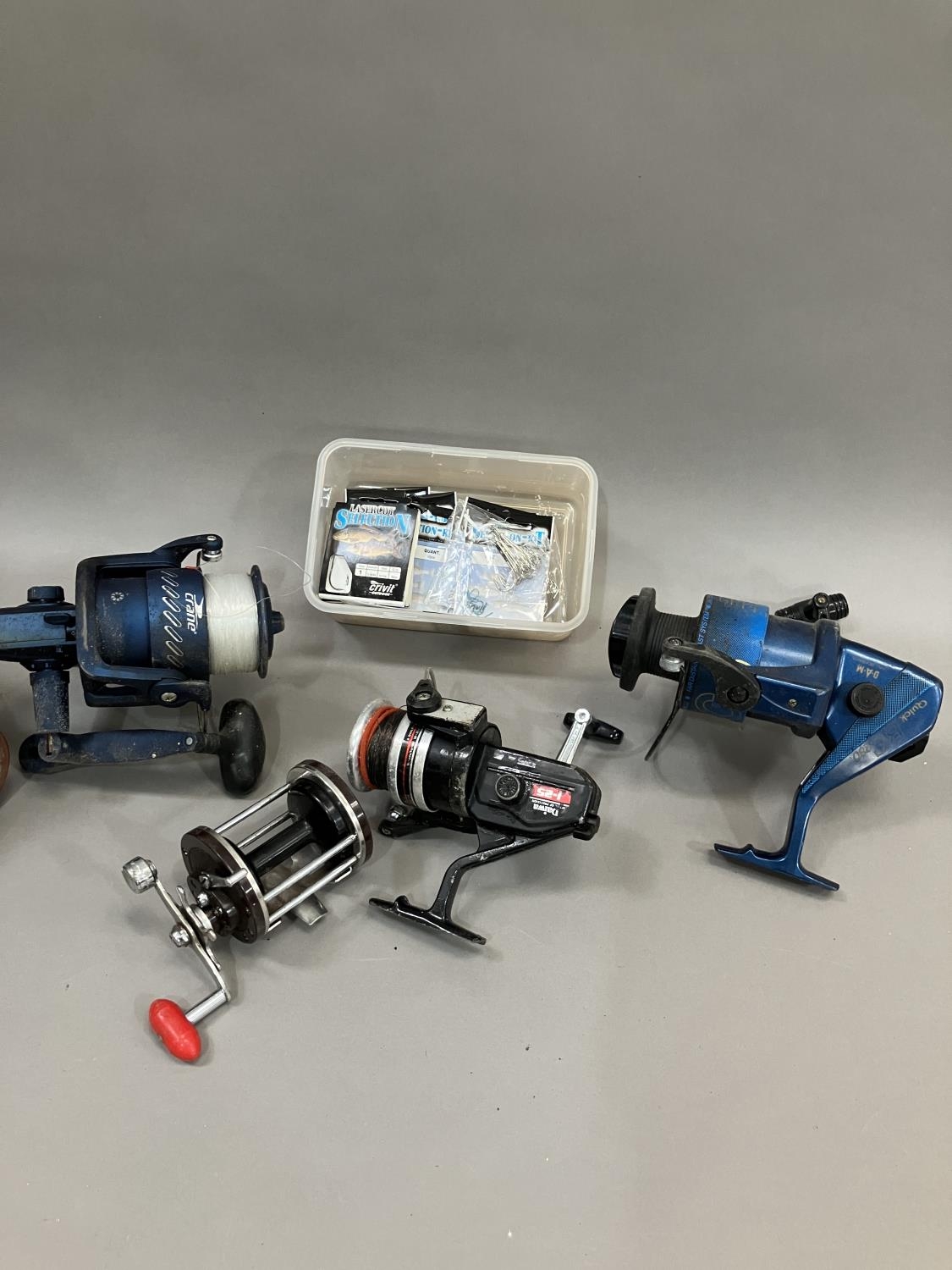 Four Sea fishing reels including a Quick BC280, a Crane Beach 700, a Daiwa 1-25 and a Japanese - Image 2 of 2