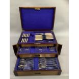 An Edwardian mahogany chest canteen of silver plated cutlery by Dixons of Sheffield comprising