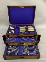 An Edwardian mahogany chest canteen of silver plated cutlery by Dixons of Sheffield comprising