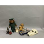 A 1950s Harrods Mouse door stop, a mid century jointed teddy bear, an original late 90s Furby, a