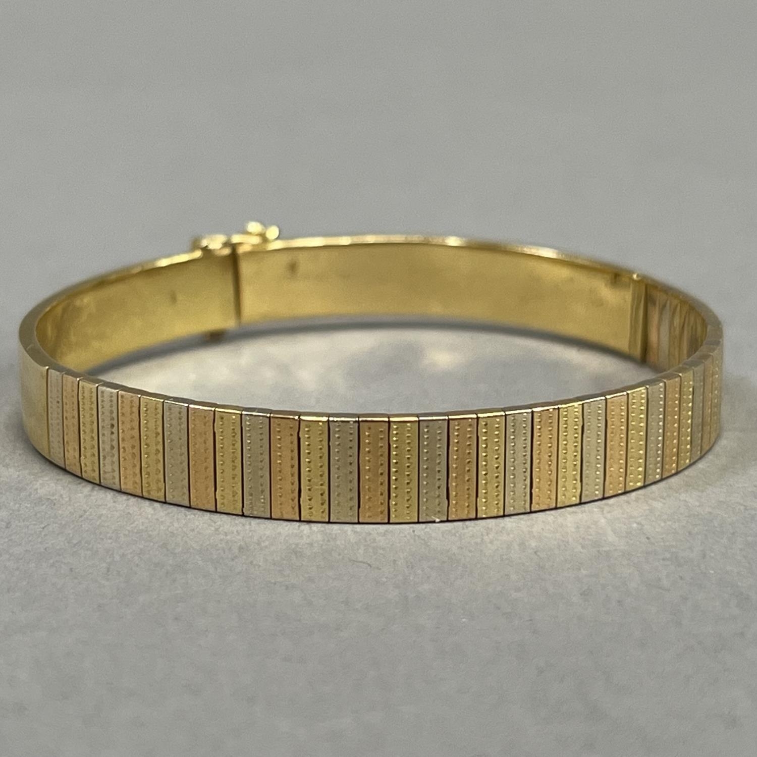 A bracelet of flexible brick type links, A/F, in white, yellow and rose metal (test as 18ct gold), - Image 3 of 3