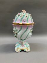 Early 20th century Dresden potpourri pedestal vase and domed cover of wrythern form, tinted puse and