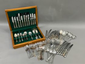 A suite of silver plated king's pattern cutlery including six dinner knives, seven dinner forks, ten