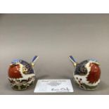 Two Royal Crown Derby Christmas robins, one a pre-release edition of 250 exclusive to Goviers of