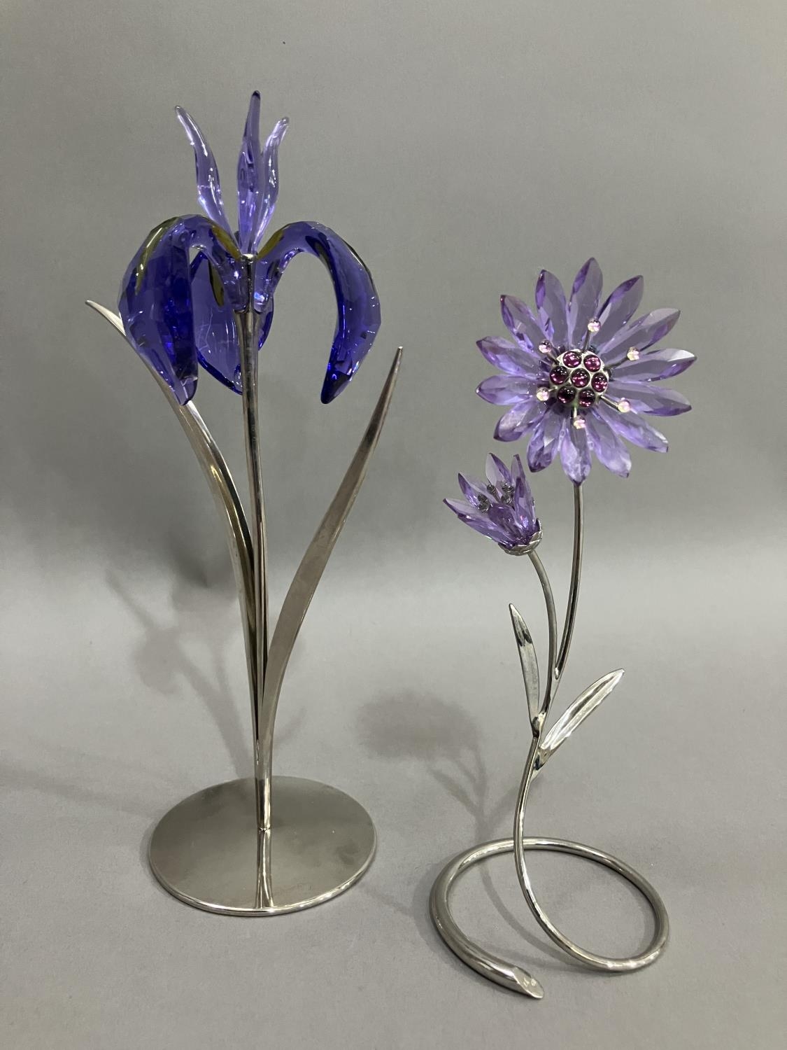 Swarovski purple iris on metal stand together with purple daisy also on metal stand