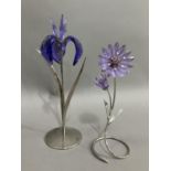 Swarovski purple iris on metal stand together with purple daisy also on metal stand