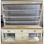 A late 19th century estate painted and stripped pine dresser and rack having a moulded cornice above