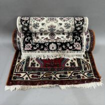 A Turkish style runner, the red ground having three quatrefoil medallions within surround of