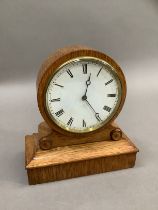 A late 19th century eight day pendulum drum time piece in a later oak case