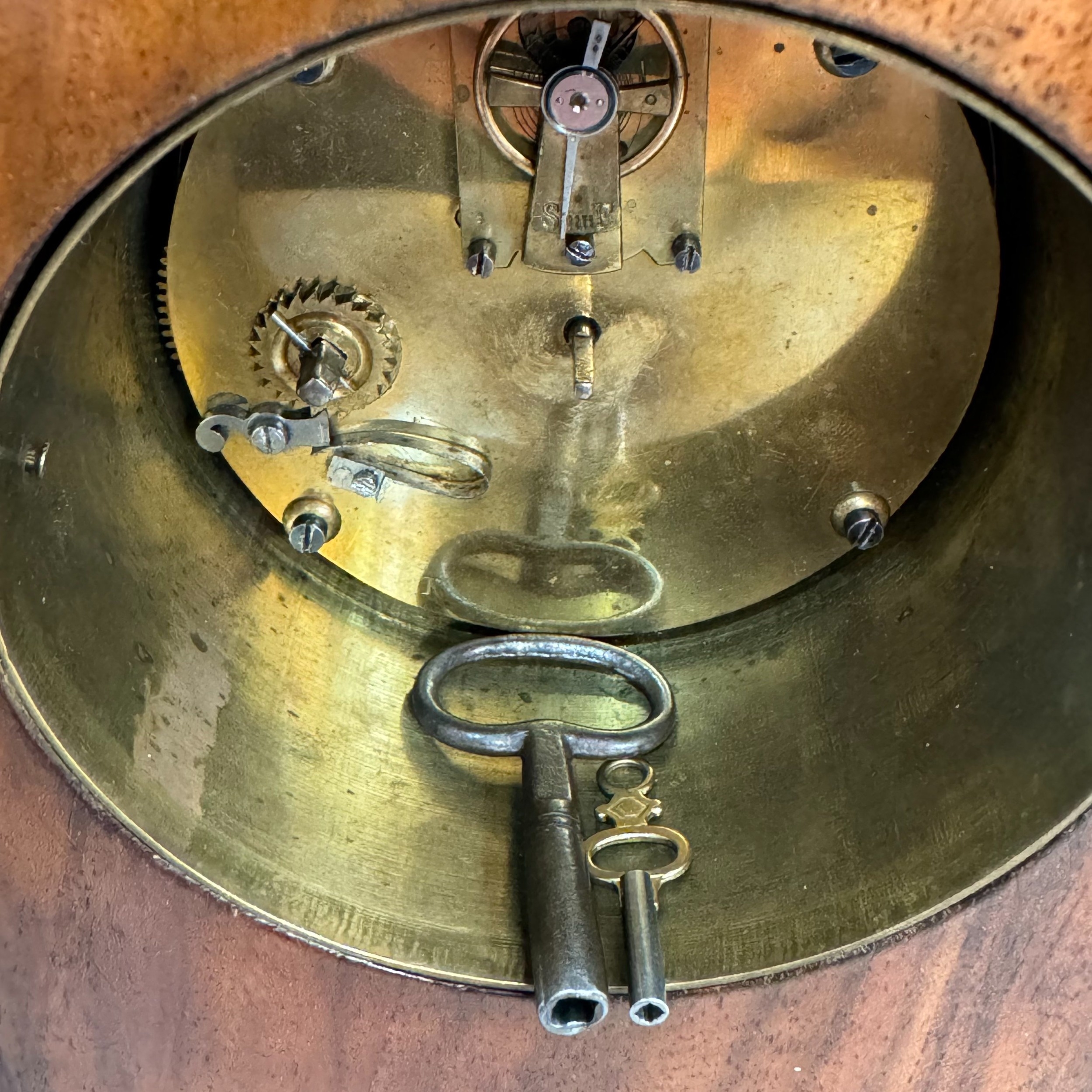 A late 19th century walnut ebonised and gilt metal bracket clock having a white enamel dial and - Image 3 of 3