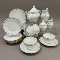 A Richard Ginori, Italy, Vecchio Capri tea service moulded with basket weave border and painted with