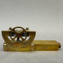 An early 20th century brass clinometer by J H Stuart, 406 Strand, London, 12cm