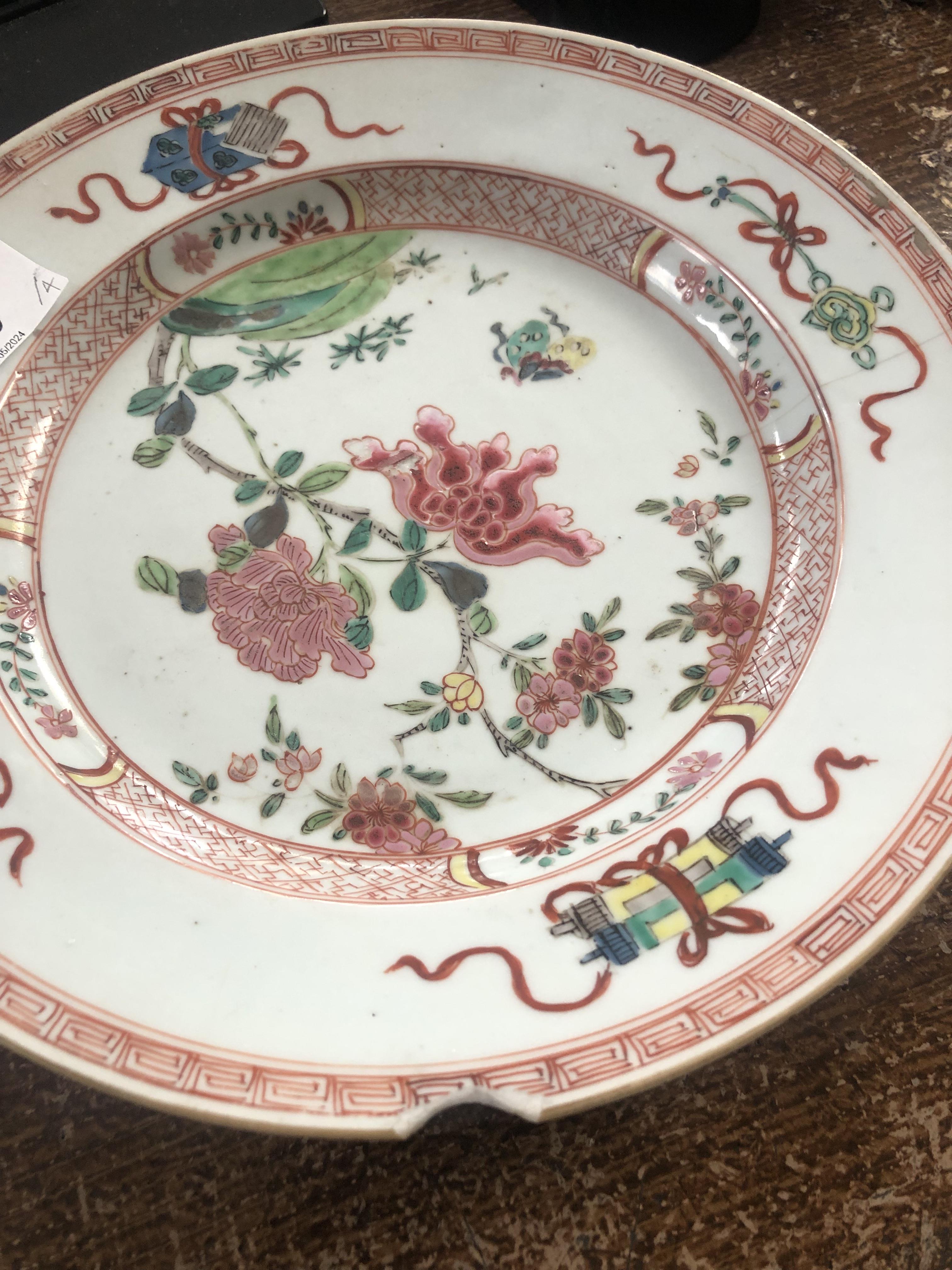 A pair of early 20th century famille rose plates painted to the centre with rocks issuing peony - Image 5 of 9