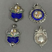 Three enamelled silver football medals - two named to W St John for Croydon casuals F C 1933-34