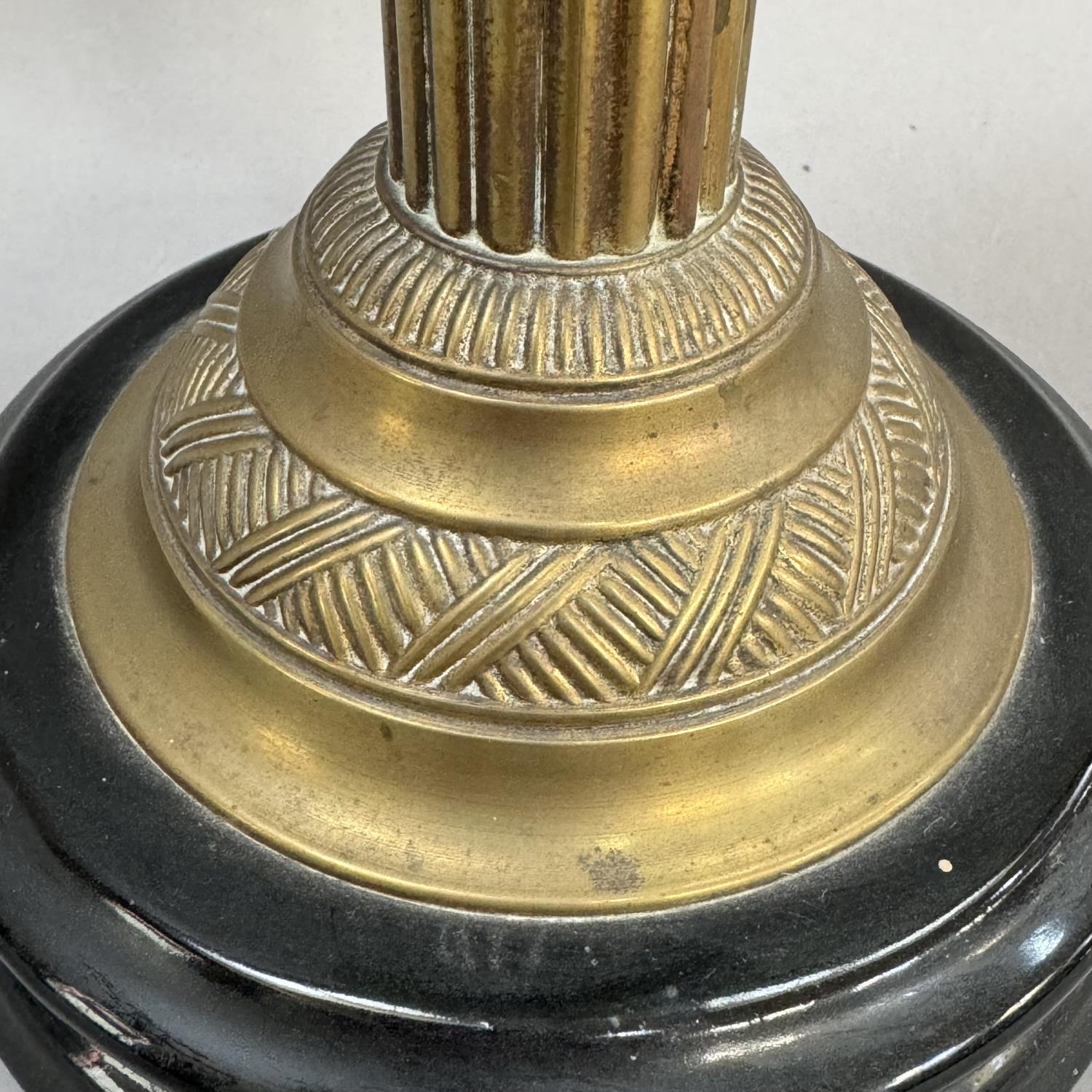 A Victorian pale green moulded glass and brass oil lamp on black circular base - Image 2 of 2