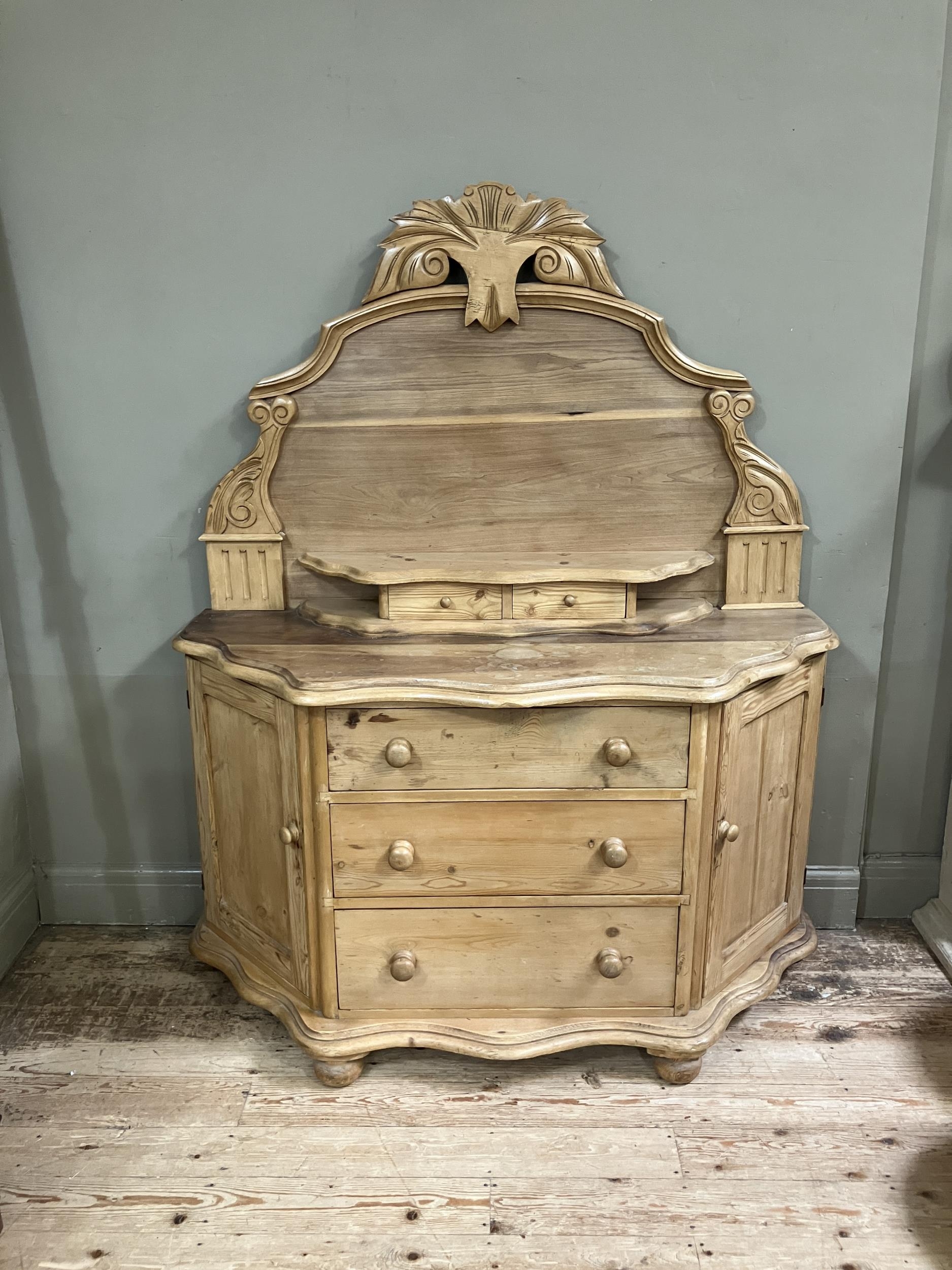 A Victorian stripped pine sideboard having an arched raised back with foliate pediment, two small - Image 2 of 2