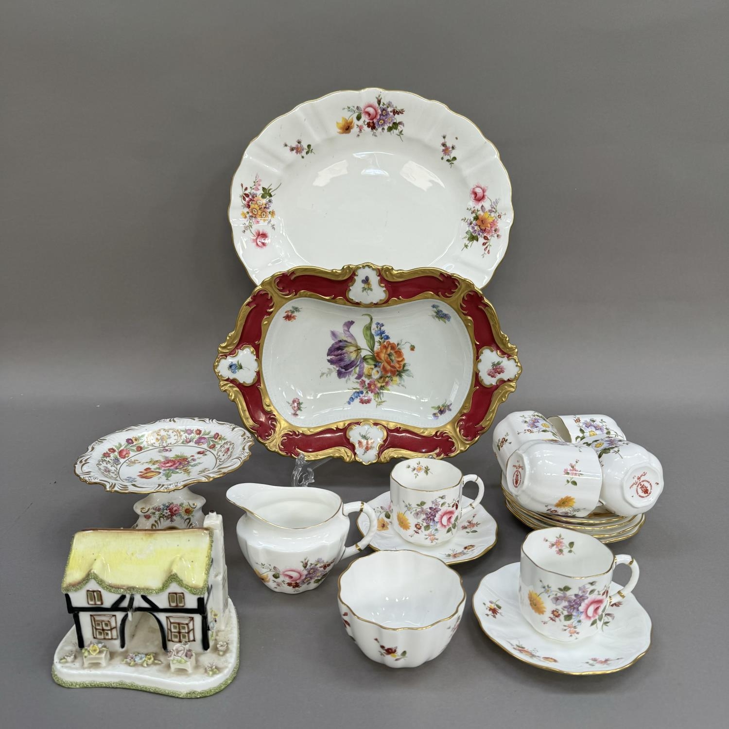A Royal Crown Derby Posies tea services comprising sugar and cream, six cups, six saucers and a