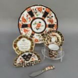 A Royal Crown Derby coffee can and saucer, pattern 2451, date cipher for 1938, together with a