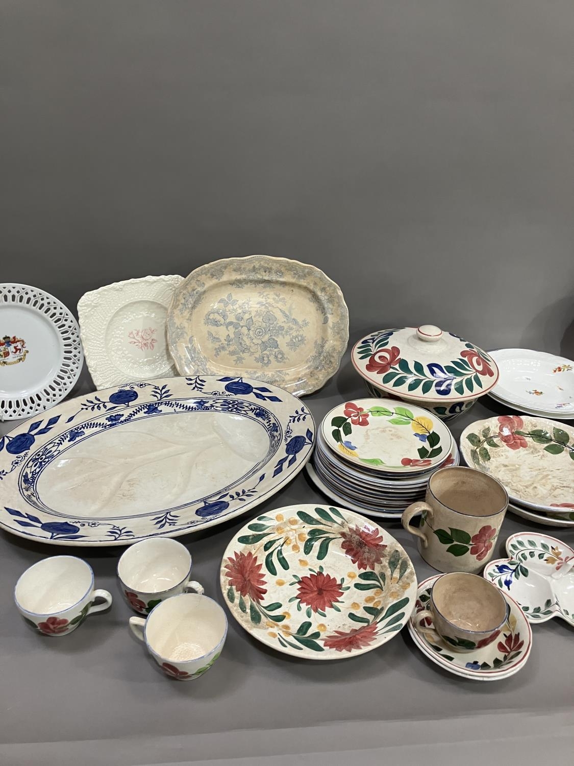 A part pottery service painted with stylised flowers including tureen, plates in different sizes, - Image 2 of 4