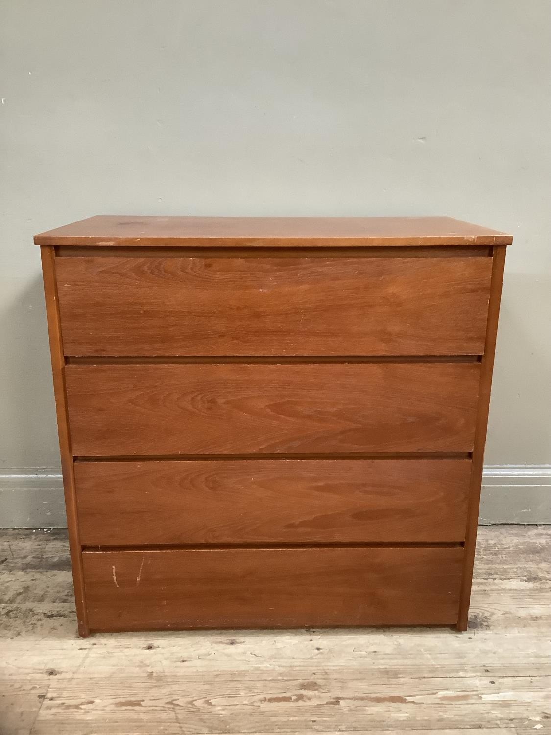 A teak three height chest of drawers, 76cm wide