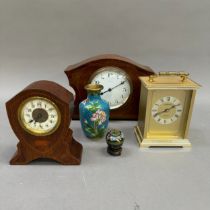 Two Edwardian mantel clocks in mahogany and in oak together with a gilt metal carriage clock and a