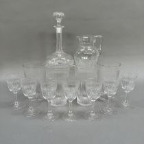A part suite of early 20th century cut and etched glass including sherry decanter and seven sherry
