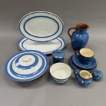 A Dartmouth Pottery cup and saucer, tea plate, lidded preserve pot, cream jug, mustard pot and large