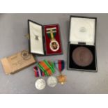 A Queen Elizabeth II Territorial medal 1952 in original box for Major G D Paterson together with