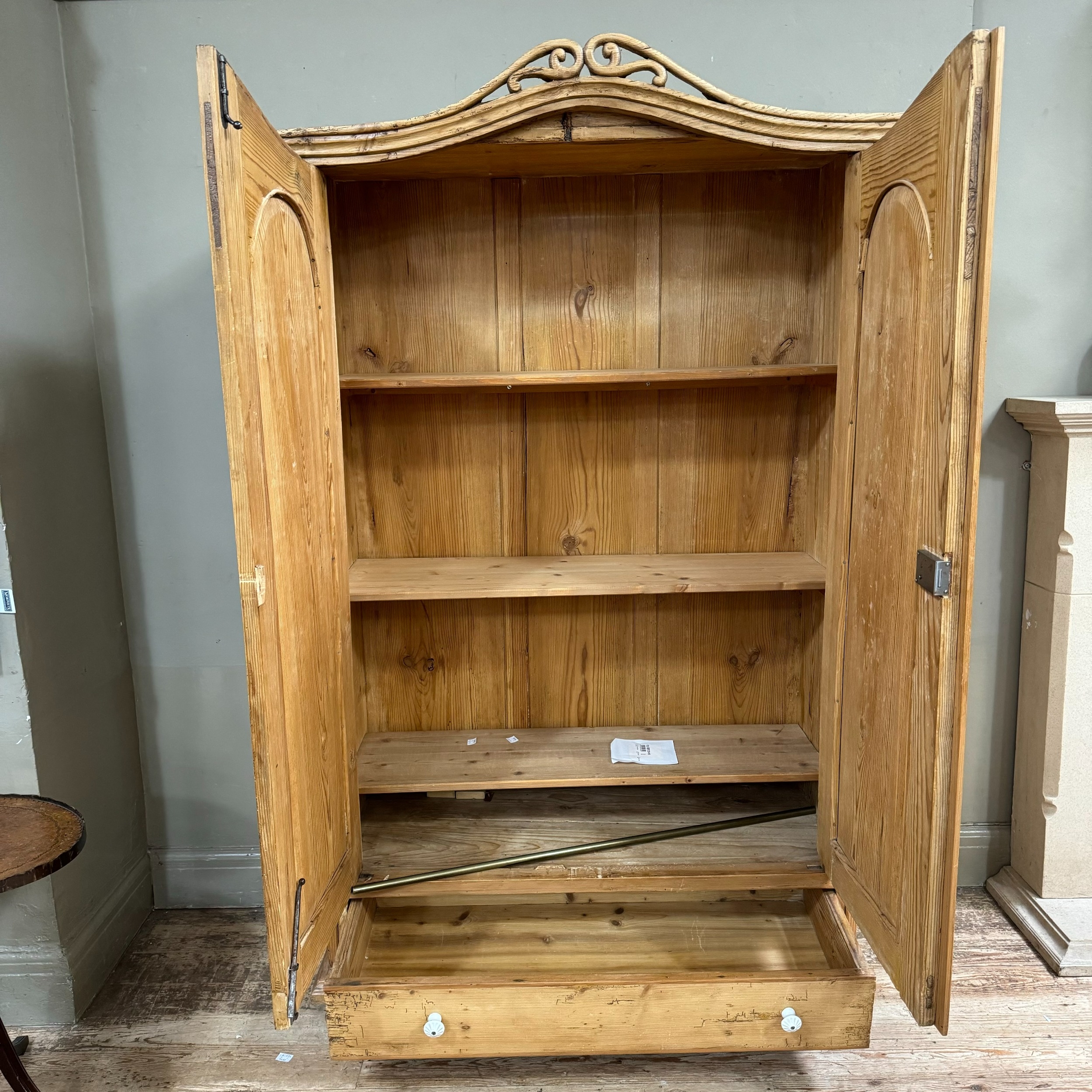 A Victorian pine two drawer armoire with arched profile with pierced pediment over two arch indented - Image 2 of 3
