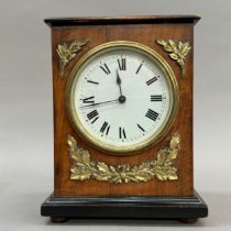A late 19th century walnut ebonised and gilt metal bracket clock having a white enamel dial and